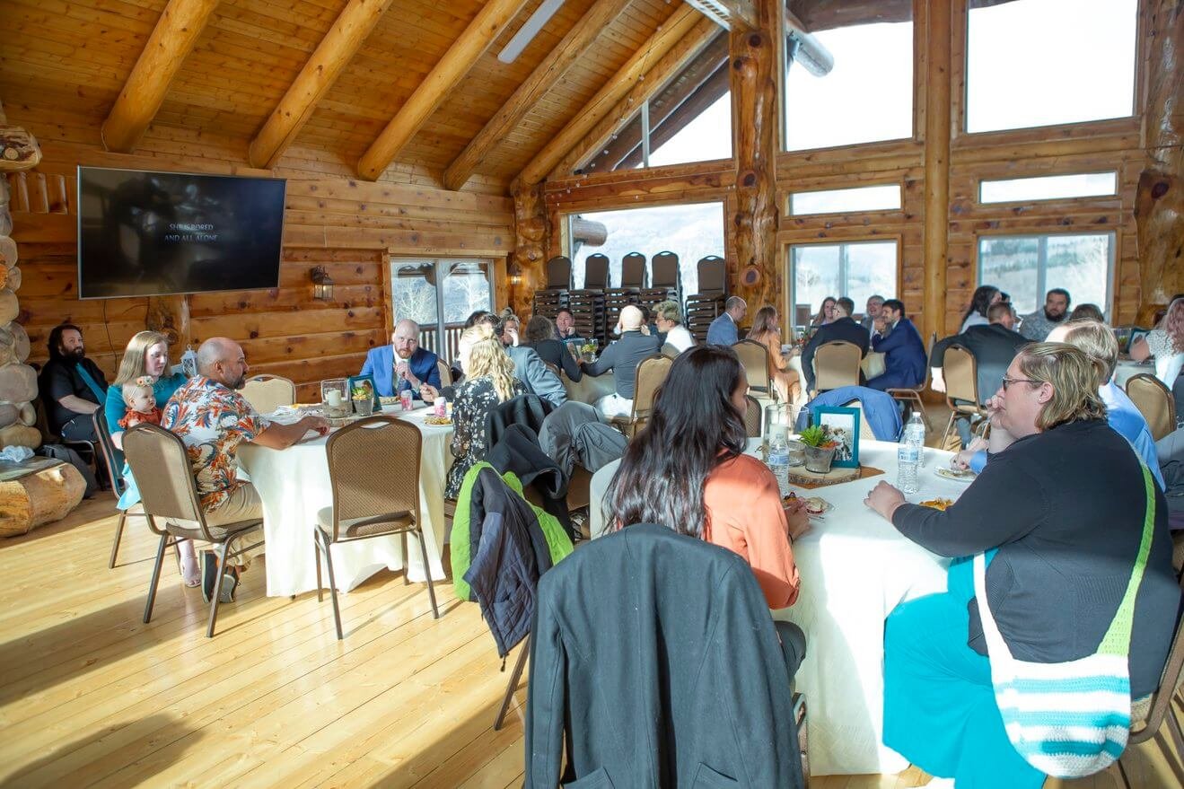 people socializing at tables in a professional event